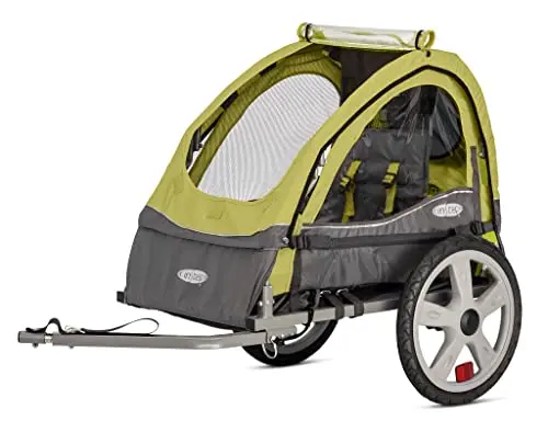 InStep Sync single seat bike child trailer in green/grey, showing folded position and canopy