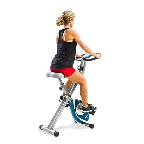 XTERRA Fitness silver folding exercise bike folded to a very small size