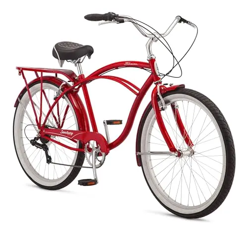 Schwinn Sanctuary 7 red cruiser bike with rear rack and vintage fenders.
