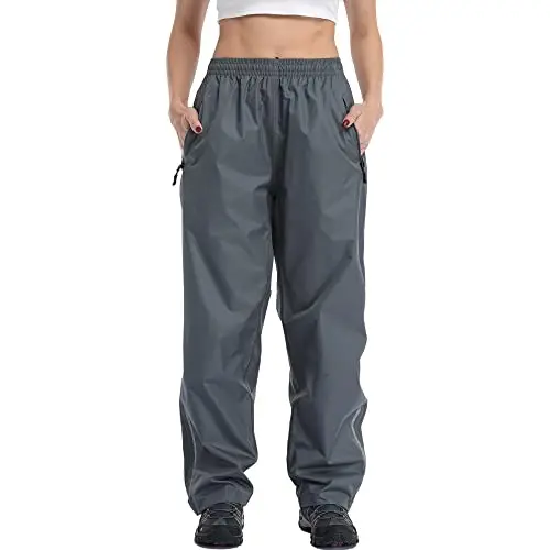 Ourcan Women's Waterproof Over Pants in gray, folded and showing half-leg zipper.