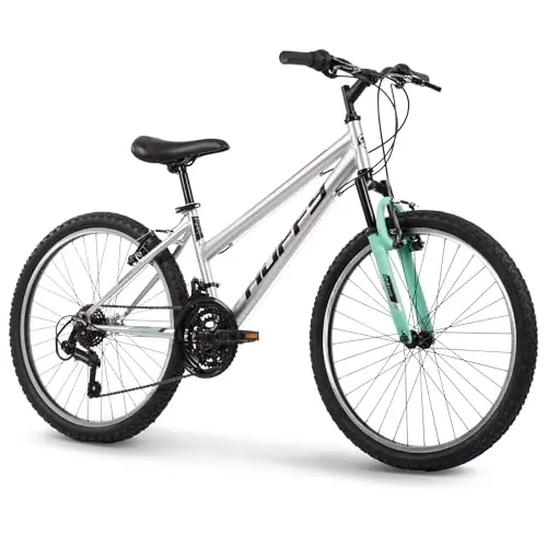 Huffy Stone Mountain 24-inch women's mountain bike with a metallic nickel frame and front suspension.