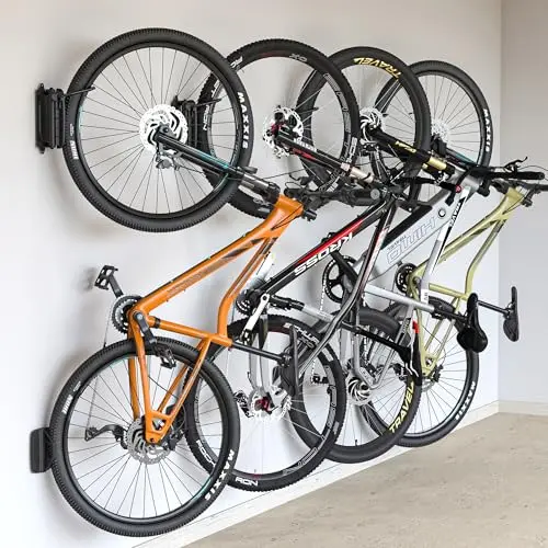 Four pack of MONTEK swivel bike wall mount hooks installed in a garage.